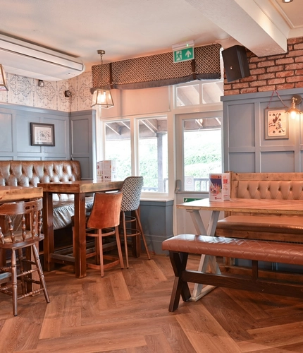 Interior dining area of a pub.