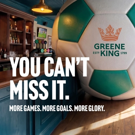 A banner promoting the new football season at Greene King Pub venues. The banner shows an interior of a Greene King Pub-branded sports bar featuring a giant football-shaped wall installation beside the bar. Large white text reads “YOU CAN’T MISS IT.” with smaller text underneath stating “MORE GAMES. MORE GOALS. MORE GLORY.” A television screen showing a football match is visible in the background above beer taps and shelves of bottles.