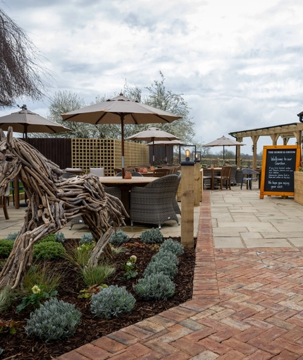 An image looking down the path towards the beer garden.