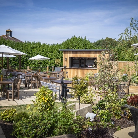 The exterior bar and beer garden seating area at The Boathouse.