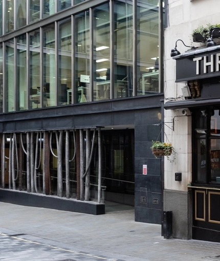 The exterior facade and venue signage of The Three Crowns.
