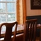 Interior restaurant tables with benches and chairs  