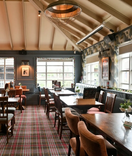 internal bar and seating area of the pub