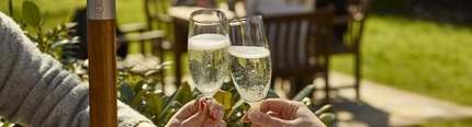 An image showing two glasses of Prosecco being enjoyed at Chef & Brewer.