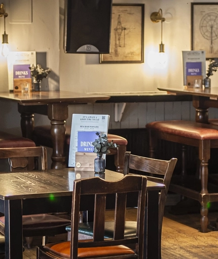 The interior restaurant seating area at The Bull.