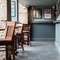 The interior seating area and wood panelled walls at Coopers in Glasgow.