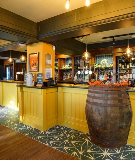 The bar in the Woodman Inn.