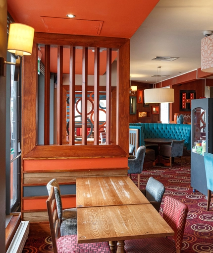 Interior dining area of a pub.