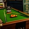 A close up view of the pool table inside the Malvern Tavern, with the balls, cues, and a sign saying "The very first game of the day is free!" on the top.