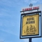 Exterior signage of the pub
