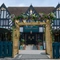 The exterior facade and seating area at the Tudor Arms.