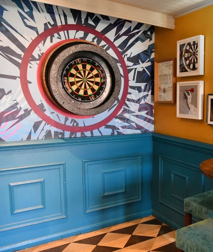 interior seating area with darts board