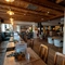 Internal seating area and restaurant area with the bar at the back at the George Abbot.