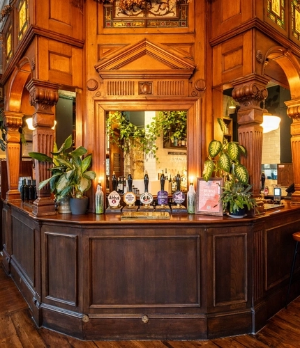 An image of the interior bar with bar stool seating at The Morgan Arms.