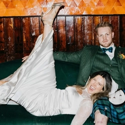 An interior portrait shot of people celebrating a Wedding at the Ubiquitous Chip in Glasgow.