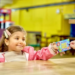 One month play pass handed to child