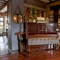 A decorative piano in The Holly Bush.