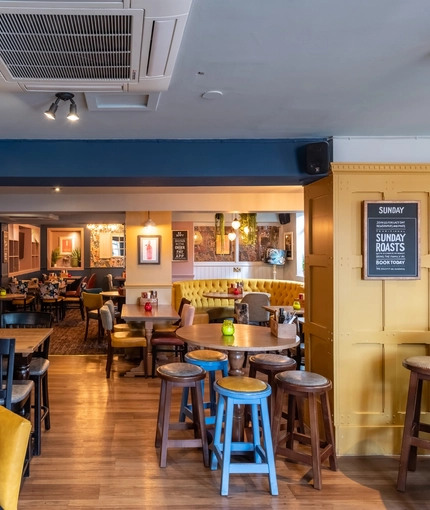 Interior dining area of a pub.