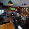 interior of the restaurant with seating area with TV