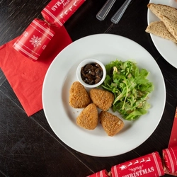 An interior shot of Breaded Brie Bites served for Christmas at Flaming Grill Venues.