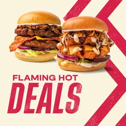 Promotional banner featuring two large burgers on a light beige background with bold red chevron graphics. One burger is topped with pulled meat, bacon, cheese, lettuce, and red onion, while the other is a crispy chicken burger with cheese, sauces, crispy onions, lettuce, and red onion. Large red text reads “Flaming Hot Deals.”