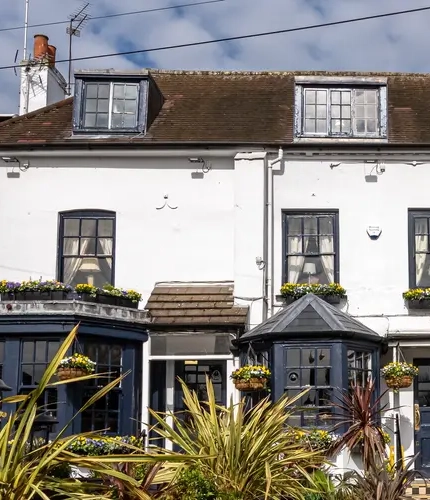Exterior of the pub with plants outside