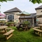 Exterior beer garden of a pub with a seating area.