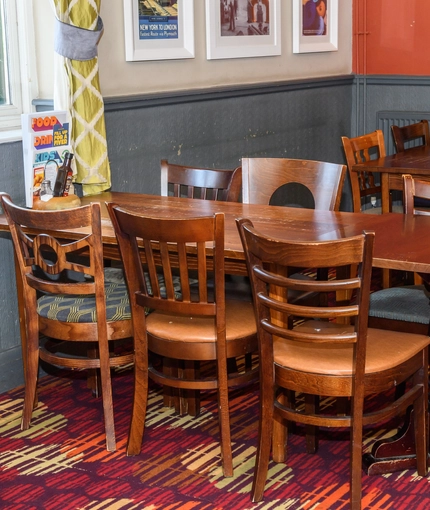 Interior dining area of a pub.