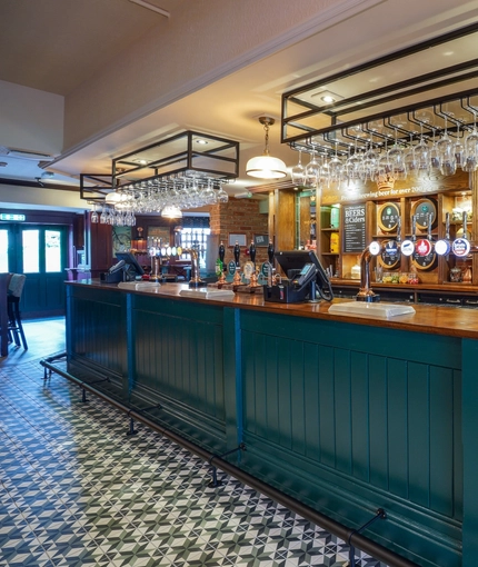 The interior bar at The Two Greens.
