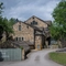 The exterior facade with signage of the Old Mill.