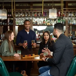 Friends having a drink at the pub