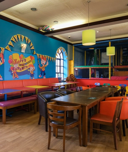 interior of the restaurant with a seating area