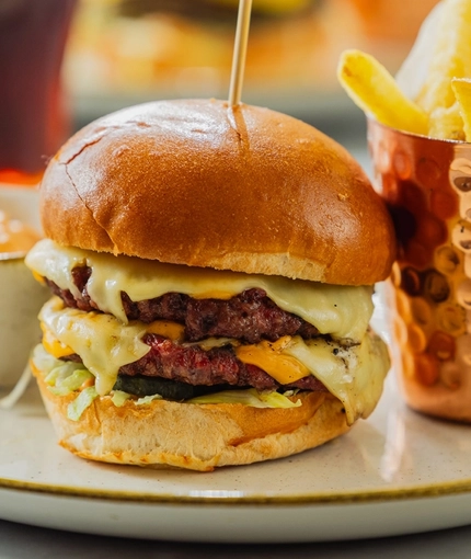 A double rib burger served at Crafted Venues.