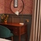 Hotel room dressing table with mirror and chair 