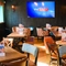 The interior restaurant and seating area with TV at the Pack Horse.