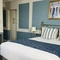 A double bed in bedroom 12 at the Coleshill Hotel.