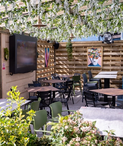 exterior beer garden with seating area
