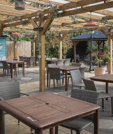 exterior beer garden with seating area