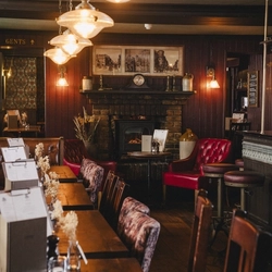 The interior restaurant and seating area at the Three Tuns.