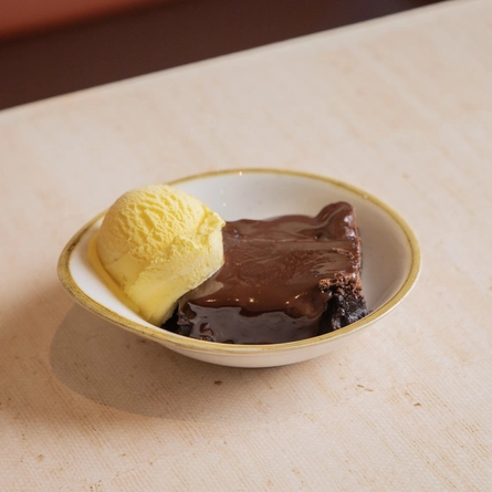 A chocolate brownie and ice cream dessert served at Farmhouse Inns.