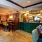 The interior bar and restaurant seating area at The Two Greens.