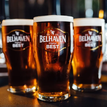 Three pints of Belhaven beer