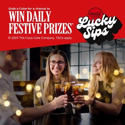 A banner showing the words "Grab a Coke for the chance to win daily festive prizes", above an image of three people holding glasses of Coca-Cola.