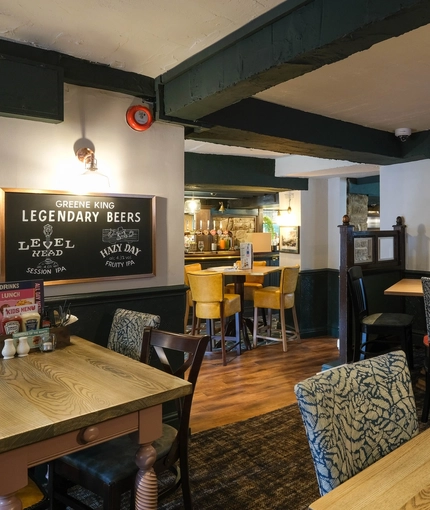 An interior shot of the restaurant, seating area and TV on display at the Sitwell Arms in Whiston.
