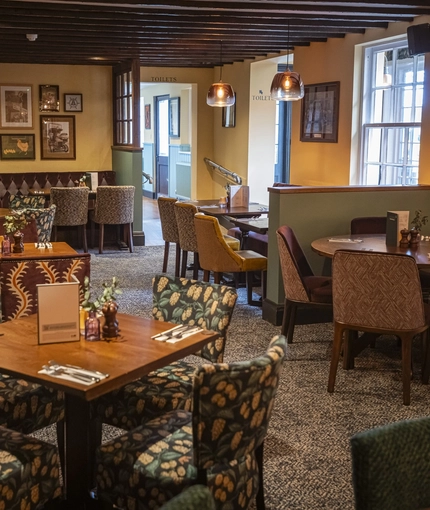 The interior restaurant and seating area at The Bell.