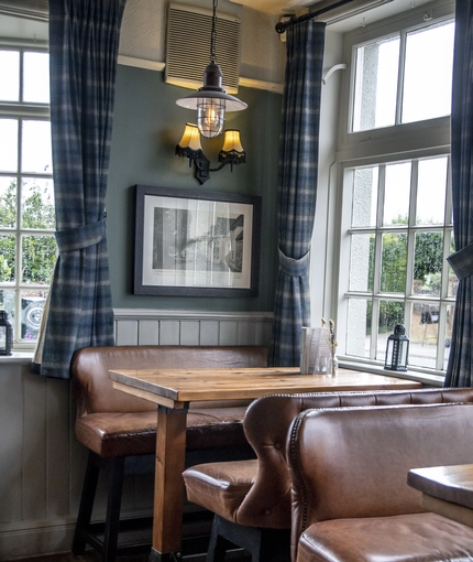 Internal seating area in a pub restaurant
