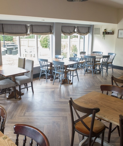 Interior dining area of a pub.