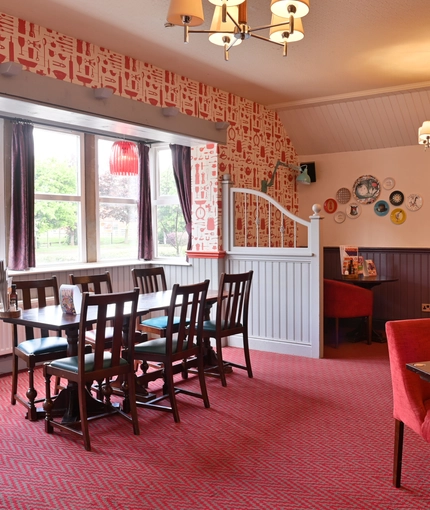 Interior dining area of a pub.