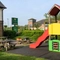 Exterior beer garden of a pub with a seating area and a playground.