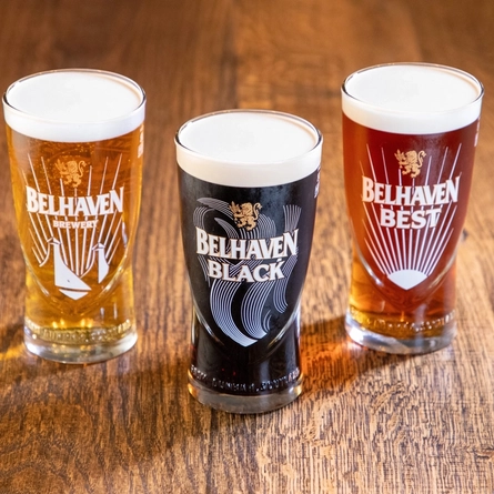 An image showing 3  pint  glasses of Belhaven Best and Belhaven Black and Belhaven.